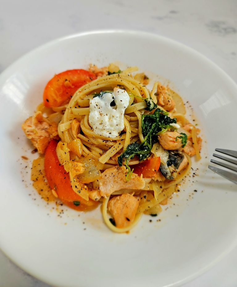 Creamy salmon pasta with cottage cheese sauce, spinach, onion, and tomatoes Healthy High Protein Creamy Salmon Pasta