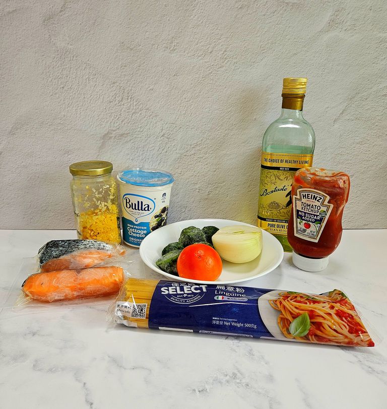 Ingredients for healthy high protein creamy salmon pasta All ingredients laid out