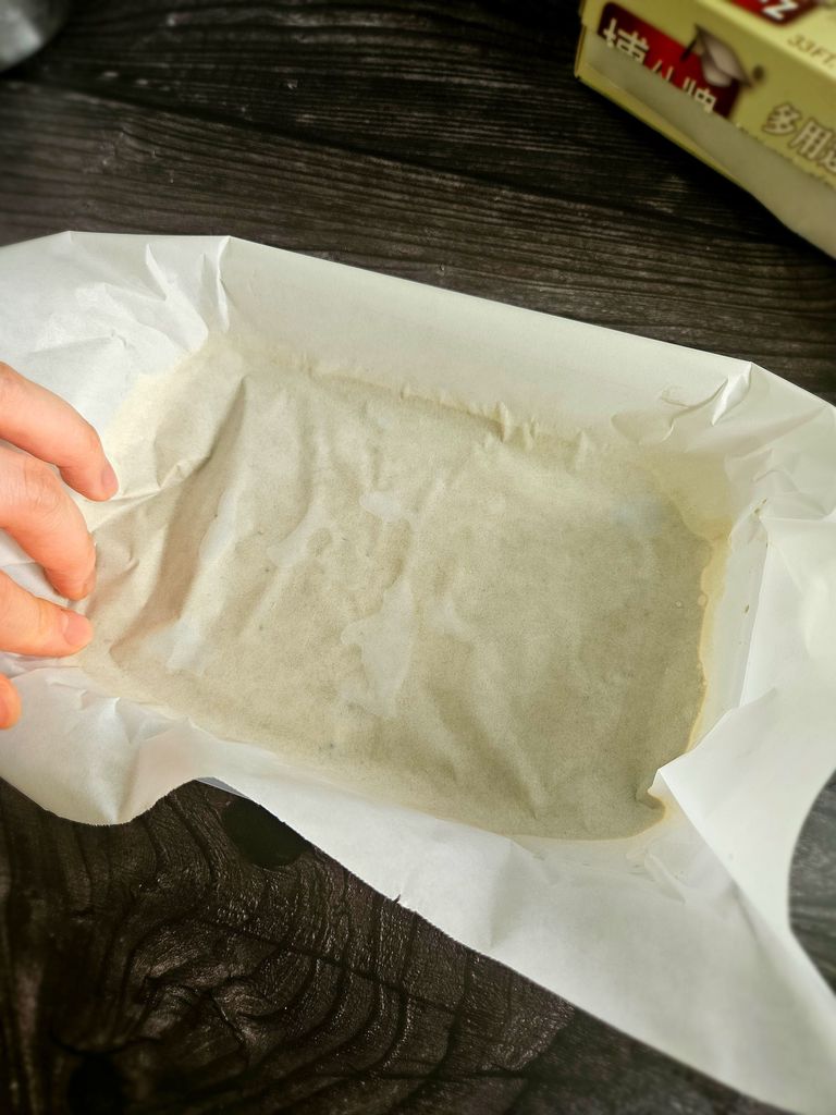 Parchment pressed directly onto the surface to reduce ice crystals Parchment paper on top