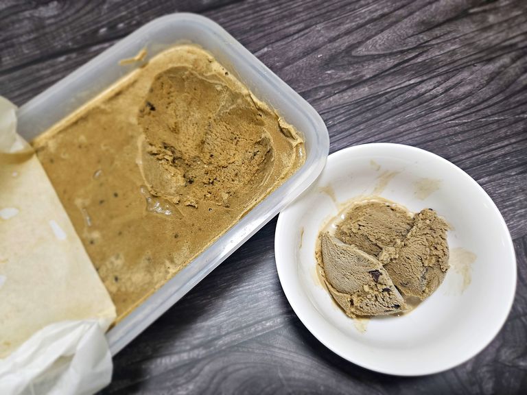 Scooping homemade hojicha ice cream Scooping