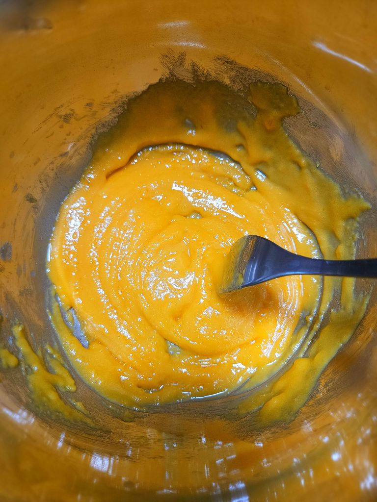 Whisking until lighter Mixing yolks